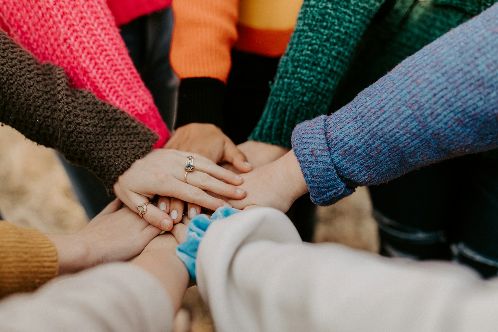 People standing together in mutual support